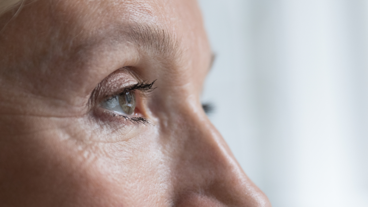 Close-up of eye and nose in profile, fine crow's-foot wrinkles