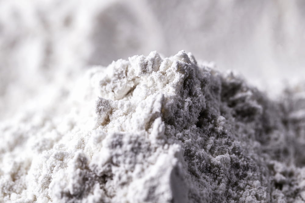 A pile of fine, light grey powder